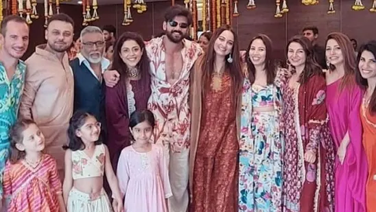 Sonakshi Sinha and Zaheer Iqbal pose with friends at their mehendi ceremony.