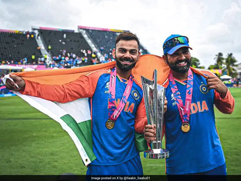 Virat Kohli and Rohit Sharma with India flag around them